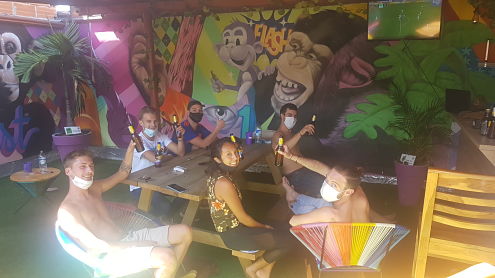guests wearing masks following coronavirus covid 19 at Purple Monkey Hostel in Medellin Colombia
