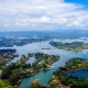 view from the top of the rock in guatape colombia with surrounding islands and lakes